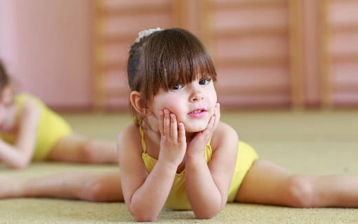 a child lying on the ground