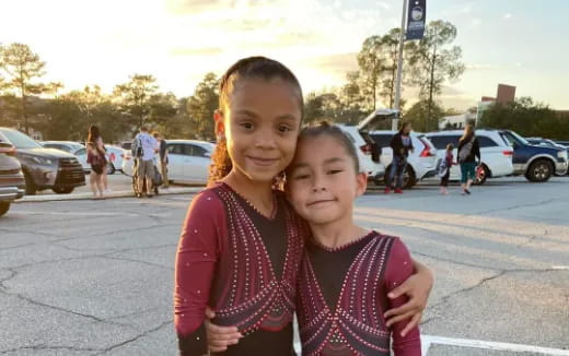 a woman and a child posing for the camera