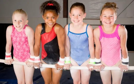 a group of girls posing for a photo