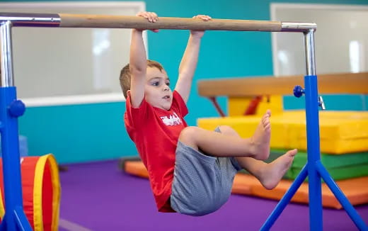 a couple of kids in a gym
