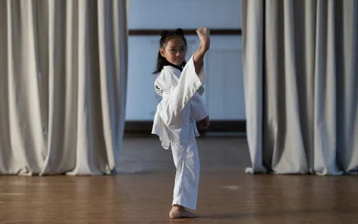a girl in a white outfit