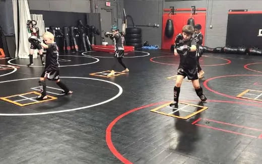 a group of people in a gym