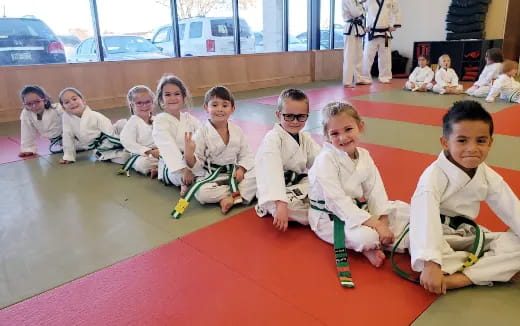 a group of children sitting on the floor
