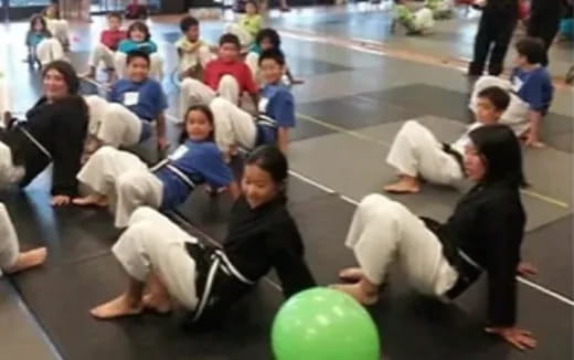 a group of people sitting on the floor