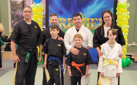 a group of people posing for a photo