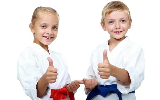 a couple of children posing for the camera