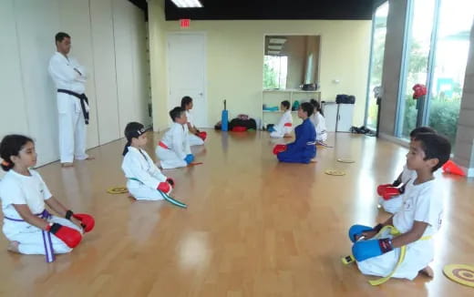 a group of children sitting on the floor