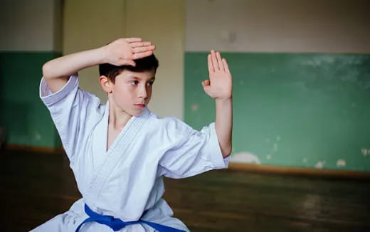 a boy in a white shirt
