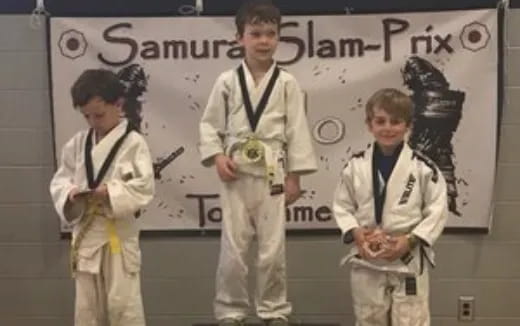 a group of people in white uniforms