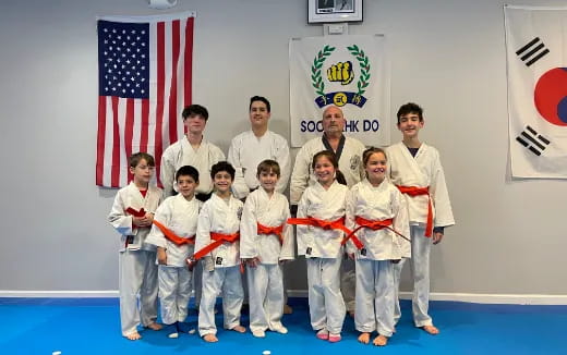 a group of people posing for a photo