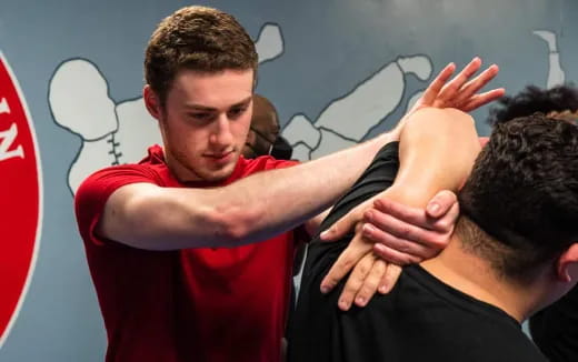 a man with his hands up