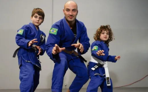 a group of people in blue jumpsuits