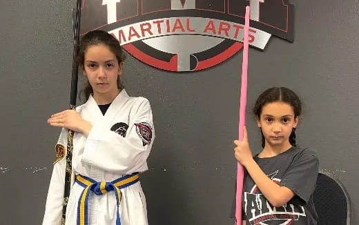 a couple of women posing for the camera