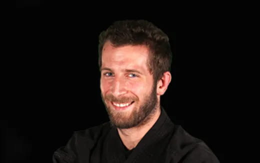 a man smiling for the camera