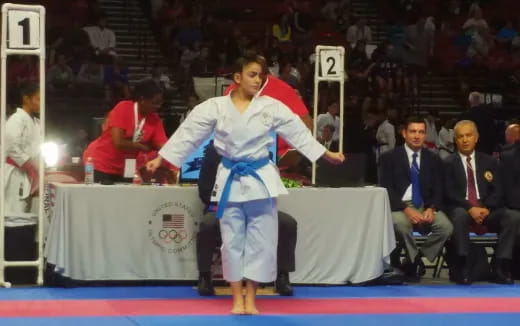 a person in a karate uniform