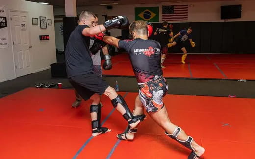 a group of people playing hockey