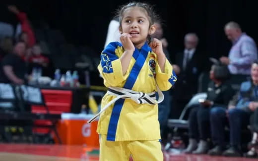 a person in a yellow uniform