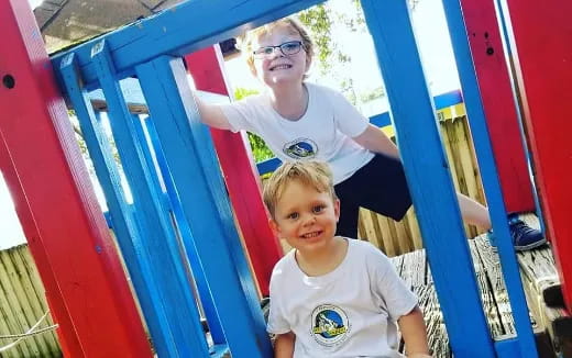 a couple of kids posing for the camera