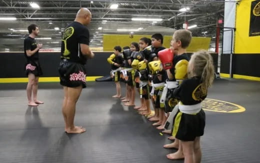 a group of people in a gym