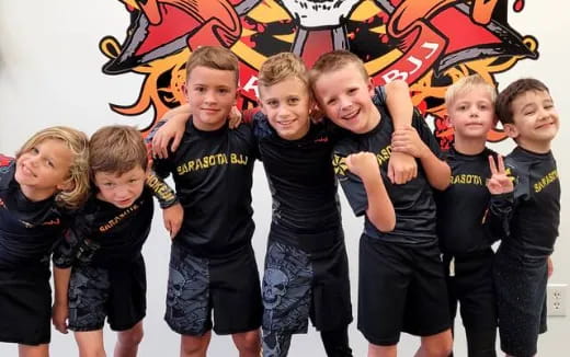 a group of children posing for a photo