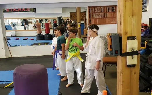 a group of people in a gym