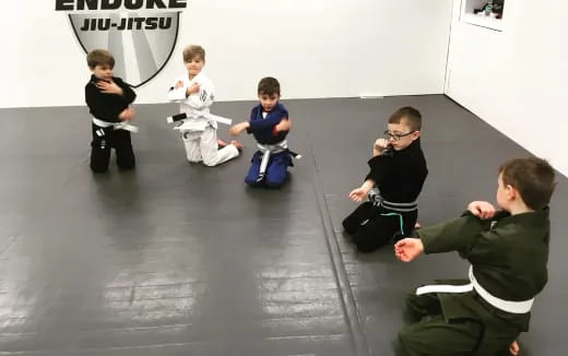 a group of children sitting on the floor