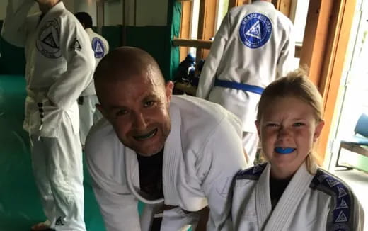 a man and a woman in white coats