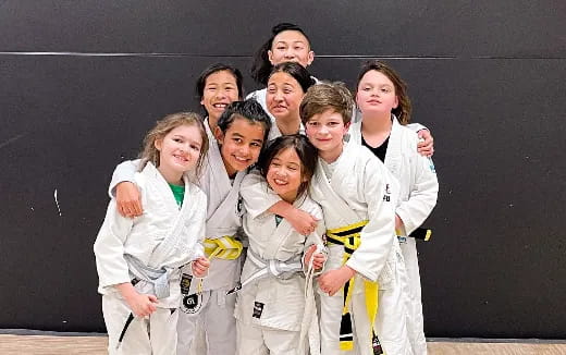 a group of people wearing karate uniforms