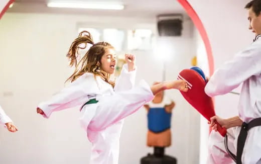 a person in a karate uniform