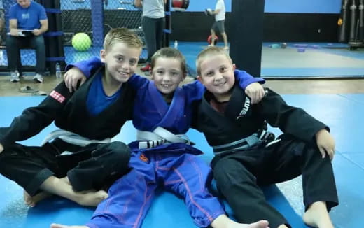a group of kids in a gym