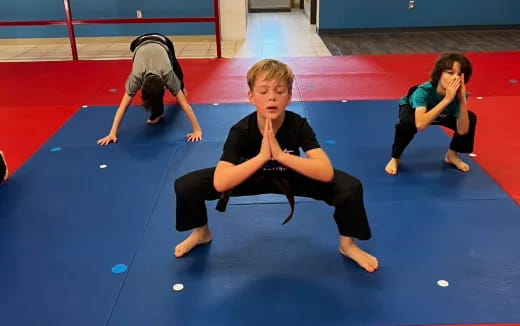 a group of people on a mat
