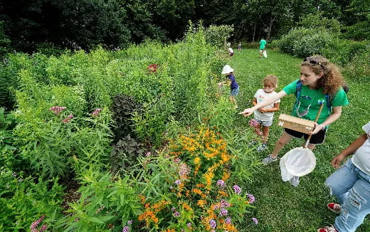a group of people in a garden
