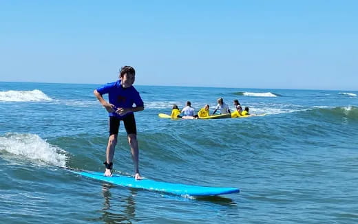 a person on a surfboard in the ocean