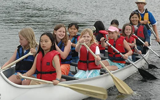 a group of people in a boat