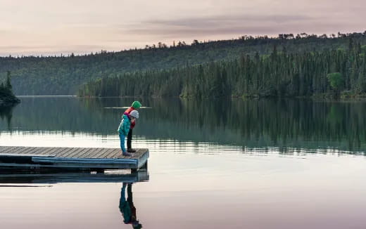 a person standing on a dock