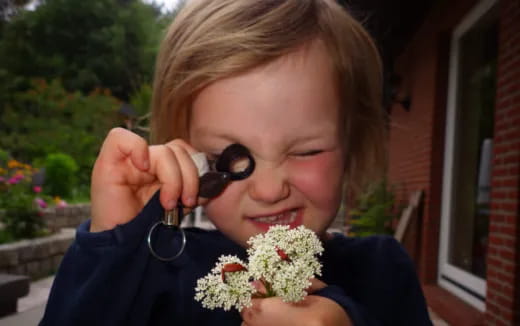 a child holding flowers