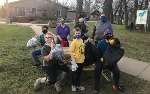 a group of people wearing masks