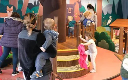 a group of children playing on a stage