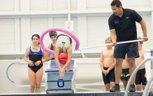 a group of people in a pool