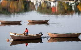 a person on a boat in the water