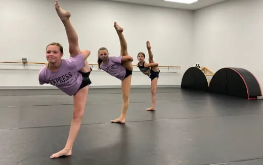 a group of people doing yoga
