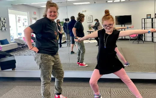 a woman and a man exercising