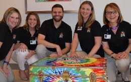 a group of people posing for a photo