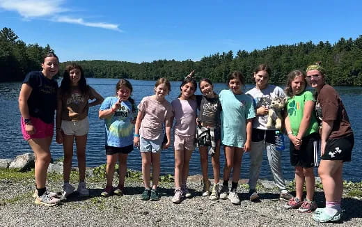 a group of people posing for a photo