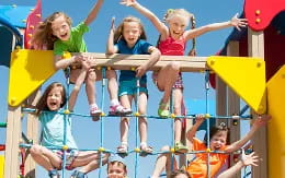 a group of children on a slide