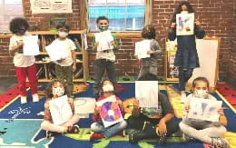 a group of children in a classroom