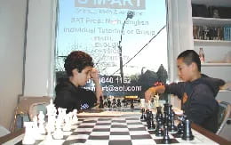 a couple of men playing chess