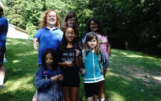 a group of people posing for a photo