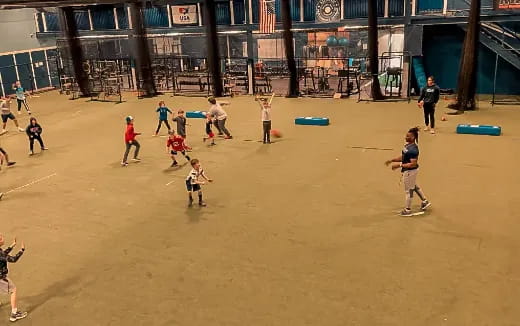 a group of people playing in a court