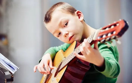 a boy holding a gun